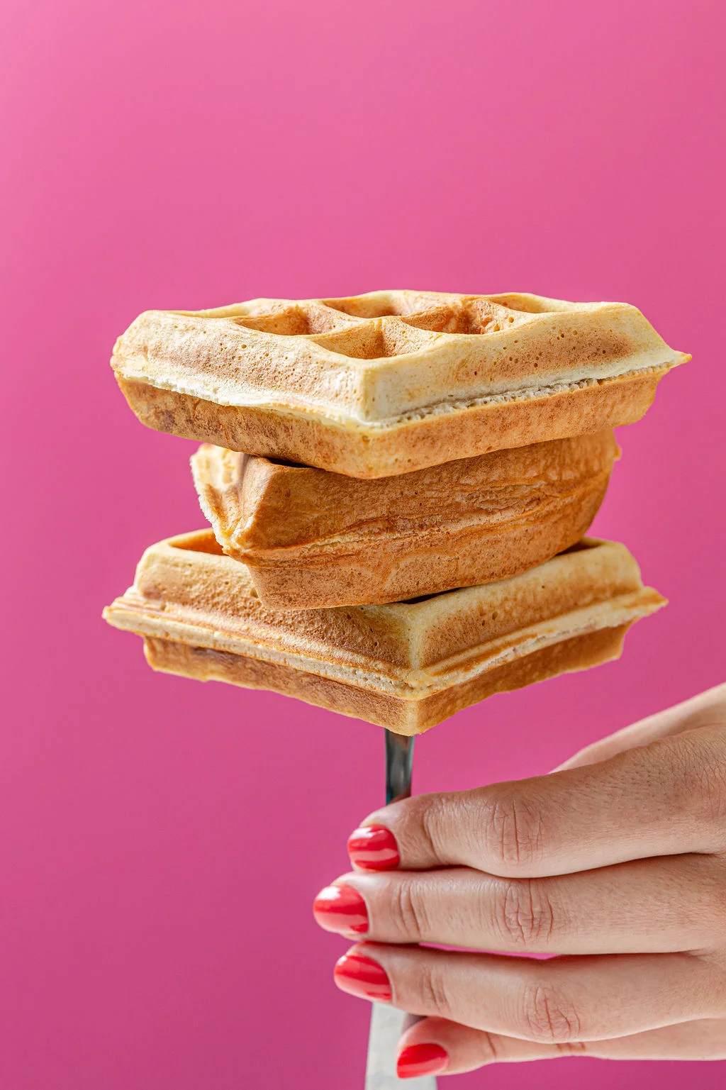 Classic Waffles Best Breakfast in Aruba Fresh Homemade Waffles Best breakfast in Aruba with classic golden waffles stacked and freshly made at Waffles Beach House